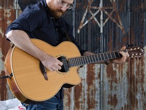 Submitted photo
Michael Schatte listens during a sound check at Signal Brewery in preparation for his upcoming Live is Where it Lives appearance on Dec. 13. The live music show hosted and produced by Joe Callahan starts a new season at Signal Brewery.