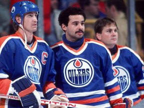 Wayne Gretzky, Grant Fuhr and Andy Moog of the 1980s Edmonton Oilers (GETTY IMAGES)
