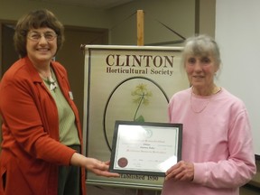 Jeannette Martin (left), secretary, presenting the Horticultural Service Certificate to Florence Pullen. (PHOTO COURTESY OF CLINTON HORTICULTURAL SOCIETY)