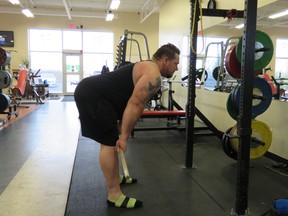 Jan Murphy perfects his form during a Romanian deadlift.  (Visionary Fitness)