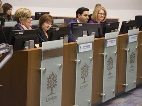 Karen Vecchio (MP for Elgin-Middlesex London), Irene Mathyssen (MP for London-Fanshawe), Peter Fragiskatos (MPP for London-North-Centre) and Kate Young (MPP for London West) met city politicians at City Hall in London, Ont. on Wednesday November 15, 2017. (DEREK RUTTAN, The London Free Press)