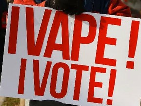 Protesters gather outside MPP Jeff Leal's constituency office raising awareness to a new law Bill 174 that could hurt the vaping industry on Friday. CLIFFORD SKARSTEDT/POSTMEDIA NETWORK