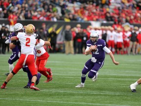 Vanier Cup MVP and Western quarterback Chris Merchant runs through a huge hole for the first touchdown on their first drive in the first quarter of the Vanier Cup at Tim Hortons Field in Hamilton on Saturday November 25, 2017. The Mustangs dominated, winning 39-17. (MIKE HENSEN, The London Free Press)
