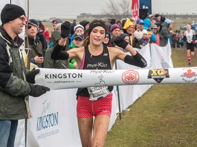 Brogan MacDougall, 17, of Kingston crosses the finish line first to take the gold medal in the junior women's under-20 race at the Athletics Canada Cross-Country Championships on Saturday, Nov. 25, at Fort Henry in Kingston. MacDougall covered the six-kilometre course in 20 minutes 50.9 seconds. (Tim Gordanier/The Whig-Standard/Postmedia Network)