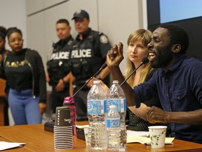Activist Desmond Cole tells the Toronto Police Services Board to end the SRO program which puts cops in schools on Thursday June 15, 2017. (Michael Peake/Postmedia Network )
