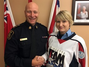 Greater Sudbury Police Chief Paul Pedersen congratulates Angela Mead, a special constable with the courts branch, on being named to Team USA for the 2017 World Ringette Championship, to be held in Mississauga from Monday until Sunday. Photo supplied