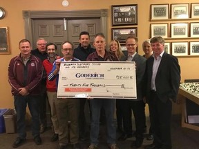 Revitalization Committee members accept a cheque from the Goderich Old-Timers Soccer Club. Team members (foreground l to r) Gerd Keller, Aurelio Henriqes, Steve Bidwell, Leo Vandervoort, Mike Strickland, and Patrick Conlon; and Park Revitalization Committee members (back row, l to r) Don Edward, Adam Moore, Leah Noel and Sarah Telford. (Contributed photo)