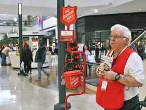 Bill Smith volunteers for the Salvation Army Chatham-Kent Ministries' Christmas Kettle Campaign at the Downtown Chatham Centre. The local Salvation Army says they are down in donations compared to last year.