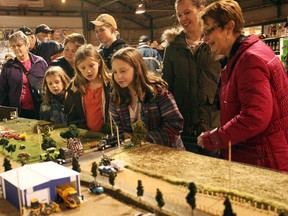 An interested group views a detailed miniature town at the Annual Collectable, Craft, Keepsake and Toy Show and Sale Nov. 25 at the Seaforth Agriplex. (Shaun Gregory/Huron Expositor)