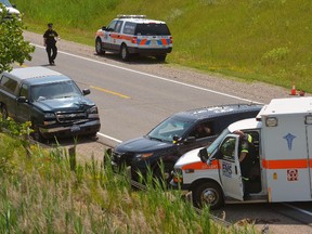 A highway construction worker was struck and killed by the green pickup truck seen in the background on the Hwy. 3 bypass. (File photo)