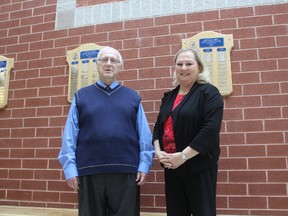 Bill Hall, vice chair of the London district Catholic school board, announced that St. Joseph’s alumni Marianne Barrie had left $500,000 after her death to be used for scholarships for graduating students of St. Joseph’s Catholic high school. Hall is joined by Jacqueline Campigotto, principal of St. Joseph’s. (Laura Broadley/Times-Journal)