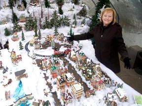 A miniature Christmas village on display at McLennan Flowers & Gifts in Lambeth is adding an extra level of Christmas cheer at the shop and also encouraging food donations for charity. (CHRIS MONTANINI\LONDONER\POSTMEDIA NETWORK)