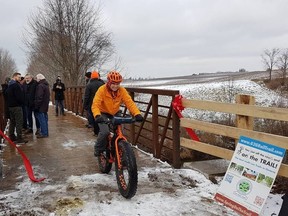 G2G representatives, community members and Huron County officials gathered at the bridge to celebrate the ribbon cutting. (PHOTO COURTESY OF G2G RAIL TRAIL)