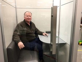SnapCab president and CEO Glenn Bostock sits in a pod designed for one to two people that was built at the company’s manufacturing plant on Railway Street. (Mike Norris/The Whig-Standard)