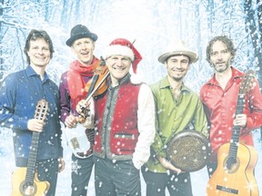 The Sultans of String, from left Eddie Paton, guitar, Drew Birston, bass, Chris McKhool, violin, Chendy Leon, percussion and Kevin Laliberte, guitar, bring their new CD Christmas Caravan to Aeolian Hall Sunday. (Special to Postmedia News)