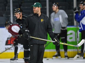Former Knight Brandon Prust was in the middle of the action as a coach at practice at Budweiser Gardens on Wednesday. He hasn?t officially retired as a pro player, but ?it?s almost that time.? (MORRIS LAMONT, The London Free Press)
