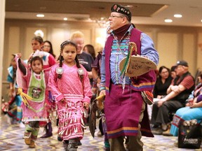 Dancers perform to the drumming and singing of the Black Bull Moose Singers during a mini powwow at the Honouring Missing and Murdered Indigenous Women and Girls Conference in Sudbury, Ont. on Wednesday November 29, 2017. The conference wraps up on Thursday. Gino Donato/Sudbury Star/Postmedia Network