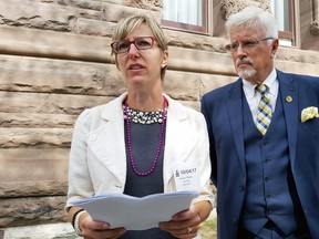 Rally organizer Alysson Storey and MPP Rob Nicholls (Chatham-Kent-Essex) stand outside of Queen’s Park in early October. Nichols was presenting a petition spearheaded by Storey to the provincial legislature calling for the installation of median safety barriers along Highway 401.