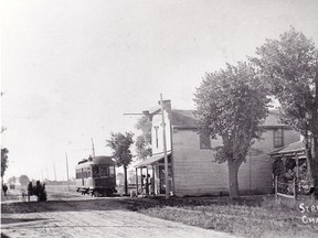 C. W. & L. E. Combination (freight-passenger) car at Charing Cross, circa 1910. The house at far right still stands. The photo is facing south.