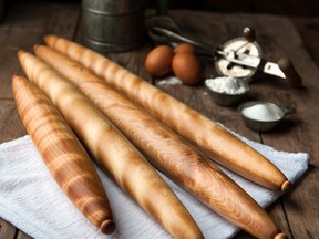 Artisan Brenda Watts of Hermitage, P.E.I., makes French rolling pins out of flame birch in her Cattails Woodwork studio. They look like freshly baked baguettes, as decorative as they are useful.  (Cattails Woodwork)