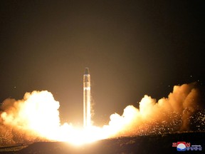 This Wednesday, Nov. 29, 2017, image provided by the North Korean government on Thursday, Nov. 30, 2017, shows what the North Korean government calls the Hwasong-15 intercontinental ballistic missile, at an undisclosed location in North Korea. (Korean Central News Agency/Korea News Service via AP)