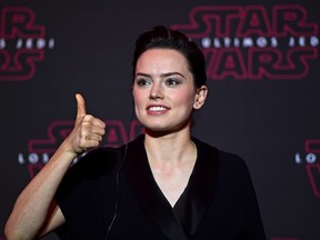 British actress, Daisy Ridley, part of the cast of "Star Wars: the last Jedi" gives her thumb up during a press conference to promote the film in Mexico City on November 21, 2017. (RONALDO SCHEMIDT/AFP/Getty Images)
