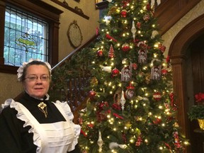 Sherry Hamilton, of the Tillsonburg Pioneers, greeted guests at Seven Gables Bed and Breakfast during the Holiday Tour of Homes in Tillsonburg Saturday. (HEATHER RIVERS/Postmedia Network)