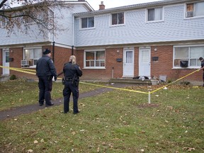 London police are investigating after a man was found stabbed on the stoop of a townhouse at 216 Boullee St. Thursday afternoon. The man was taken to hospital with life-threatening injuries. Police say they believe the assault happened at a different location.  (DEREK RUTTAN, The London Free Press)