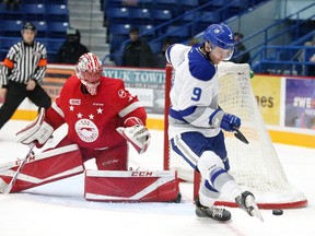 Gino Donato/Postmedia Network
Dawson Baker of the Sudbury Wolves tries to control the puck with his skate in front of Sault Ste. Marie Greyhounds goatender Matthew Villalta of Godfrey during an Ontario Hockey League game on Oct. 1.