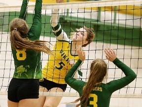 Sydney Coles of the Lockerby Vikings returns the ball during senior girls high school volleyball action against the Confederation Chargers in Sudbury, Ont. on Thursday November 30, 2017. Gino Donato/Sudbury Star/Postmedia Network