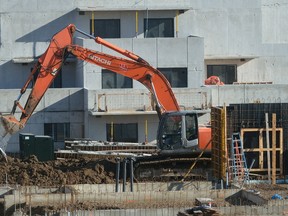 Construction continues on the Waterdale Walk apartments on Sunningdale Road at Adelaide Street in London, Ontario. Photographed on Friday December 1, 2017. (MORRIS LAMONT, The London Free Press)