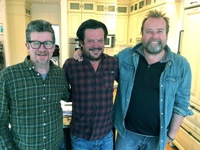 The Tragically Hip's Paul Langlois is flanked by Skydiggers Andy Maize and Josh Finlayson. All three performed at a fundraiser for Hospice Kingston's Capital Campaign at the Isabel Bader Centre for the Performing Arts Friday night. Peter Hendra /The Kingston Whig-Standard/Postmedia Network