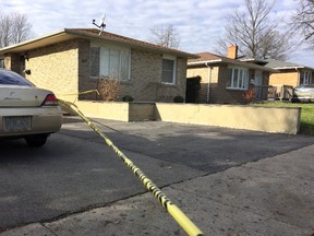 Police tape blocks off the entrance to 789 Nixon Ave. where a man was shot in the early morning of Saturday, Dec. 2 in London, Ontario. (JANE SIMS, The London Free Press)