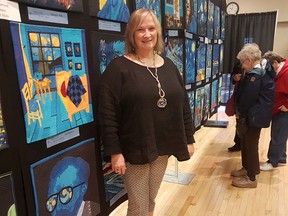 Last Friday, owner of Harvest Quilt Shop in Seaforth, Trina O’ Rourke stood next to some of the quilts created by contestants in the van Gogh Cherrywood Challenge Special Exhibit. Thanks to O’ Rourke , this is the first time this has happened in Canada. (Shaun Gregory/Huron Expositor)