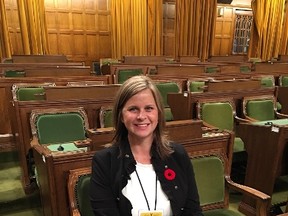 Hilltop teacher Jennifer Keay sits in MP Catherine McKenna's seat while visiting the House of Commons chamber in Ottawa last month (Submitted).