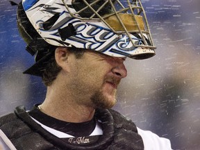 Toronto Blue Jays catcher Gregg Zaun is sprayed with water by teammates while waiting to do an interview after the Blue Jays defeated the Los Angeles Dodgers 12-1 on June 6, 2007. (Greg Henkenhaf/Toronto Sun/Postmedia Network)