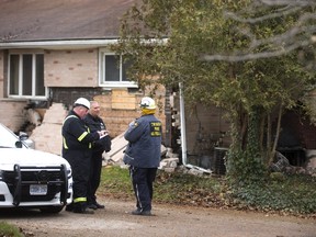 Clive Hubbard, a fire investigator for the Ontario Fire Marshal, is investigating an explosion and house fire at 1335 Hamilton Road in London. The explosion and subsequent fire happened late Monday afternoon and the investigation continued on Tuesday. Photograph taken on Tuesday December 5, 2017. (MIKE HENSEN, The London Free Press)