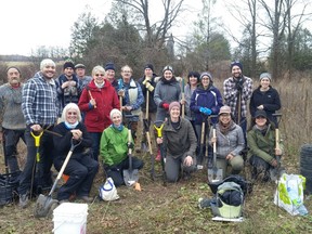 The enthusiastic volunteers pose for a group photo at the Hopkins Creek site near Holmesville. (PHOTO COURTESY OF NCC)