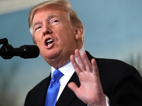 President Donald Trump speaks in the Diplomatic Reception Room of the White House, Wednesday, Dec. 6, 2017, in Washington. Trump recognized Jerusalem as Israel's capital despite intense Arab, Muslim and European opposition to a move that would upend decades of U.S. policy and risk potentially violent protests. Vice President Mike Pence listens at left. (AP Photo/Evan Vucci)