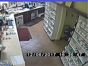 Sarnia police have released a surveillance camera image from a robbery Wednesday at a pharmacy on Wellington Street. (Handout)