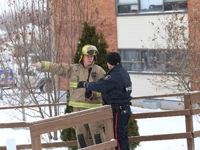 About a dozen residents of the building at 236 Jogues Street were seen milling around outside or warming up in the building next-door after they were evacuated by unsettling event shortly after 10:30 a.m.