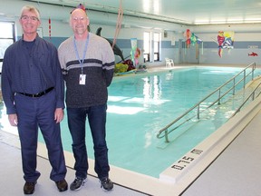 Tim Bechard, left, and Dave Schaller with Pathways Health Centre for Children in Sarnia stand by the centre's therapeutic pool. An engineering study is being conducted to help find cost savings so hours can potentially be extended at the well-used facility, Bechard said.  Tyler Kula/Sarnia Observer/Postmedia Network