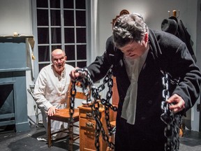 Cory LaPointe
Jim East, as Scrooge, and David Lay, as the ghost of Jacob Marley, in A King’s Town Players production of A Christmas Carol.