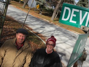 Randy Evans and Tom St. Amand pose in 2016 by the intersection of Devine Street and Christina Street South in Sarnia. They recently updated a research project investigating Sarnia's more-than-700 streets. (Observer file photo)