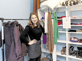 Heather Poechman stands in the new, but bare, home for the Queen’s Winter Coat Exchange, in the Room of Requirement, Room 238 in the John Deutsch Centre on the Queen’s University Campus. (Julia McKay/The Whig-Standard)