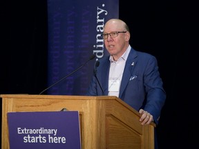 Aubrey Dan addresses dignitaries and students Monday at Western University. For the second time, Dan has donated $5 million to the DAN Department of Management and Organizational Studies at Western University. (Derek Ruttan/The London Free Press)