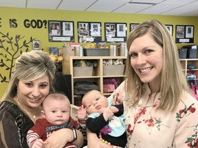 Roots of Empathy participants Ginny Long and baby Lukus Long, and Beth Lapalme and baby Anne Lapalme, volunteer their time at St. David Catholic School to participate in the program with kindergarten classes. Supplied photo