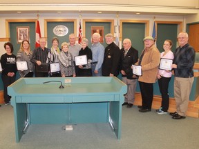 A group of St. Clair Township residents received Good Neighbours certificates prior to the Dec. 4 council meeting. From left are: Liz Lovell, Lyla Kennedy, Peggy Jenkins, Peter Cassel, Bev Cassel, Cel Simpson, Ken Simpson, Penny Miller, Doug Miller, Mayor Steve Arnold, Dave Robinson, John Wilson, Colleen Flesher and John Flesher (two-time winners).
CARL HNATYSHYN/SARNIA THIS WEEK