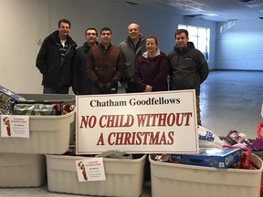 Union Gas Employees and last year Chatham Goodfellows award winners Angela Scott and Brian Cox with their Union Gas colleagues, Julien Samson, Nelson Cordeiro and Nico Cariati drop of full bins of toys to the Chatham Goodfellows toy barn to ensure "No Child Without a Christmas."