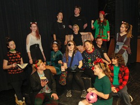 The cast and crew of the The Naughty List: A Crooked Children Christmas, pose for a photo in character on the stage at Kingston Collegiate in Kingston, Ont. on Thursday December 7, 2017. For one night only, admission by monetary donation, the performance will be one of the Theatre Complete students final exams, while also giving back to children in need, with 100% of the donations being giving to University Hospitals Kingston Foundation. Julia McKay/The Whig-Standard/Postmedia Network